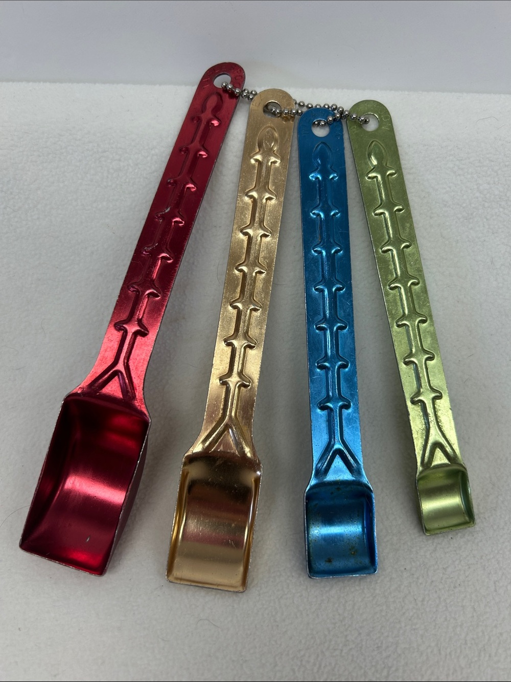 Vintage 50’s “Tallscoops” aluminum set of 4 different coloured measuring spoons